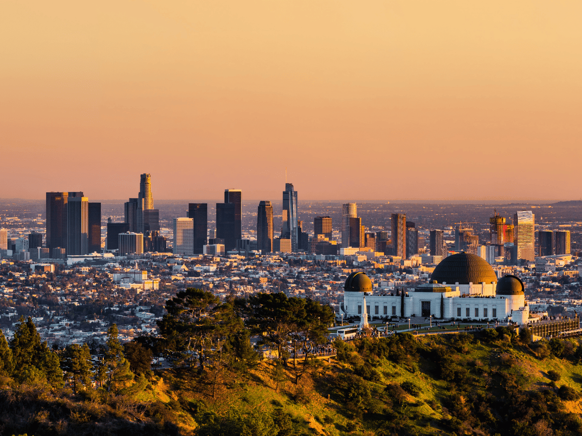 Spanish-style arches and tree-lined streets in Los Angeles, California.